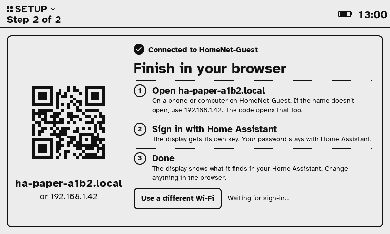 Second setup screen: a QR code and the address ha-paper-a1b2.local, with three steps: open the address, sign in with Home Assistant, done.